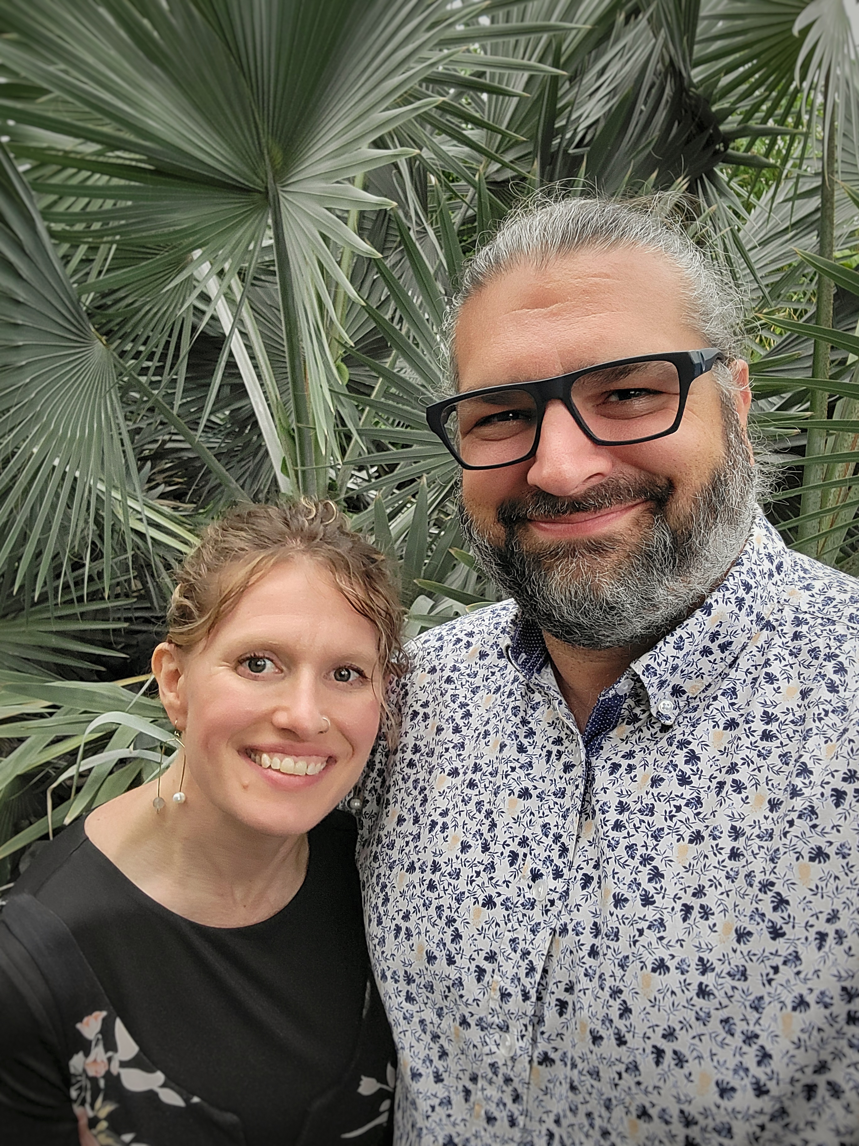 Sven and his partner posing for couple's selfie.